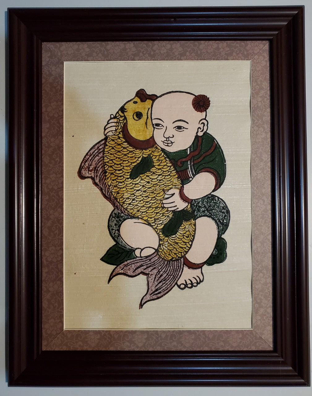 Ý nghĩa tranh em bé cưỡi cá chép